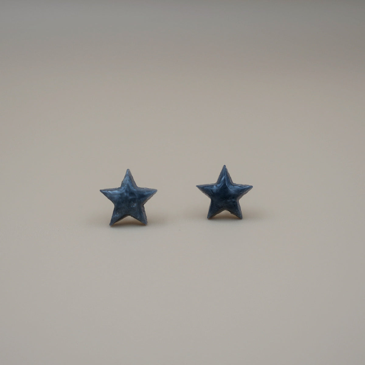 Aretes Estrellas Gris