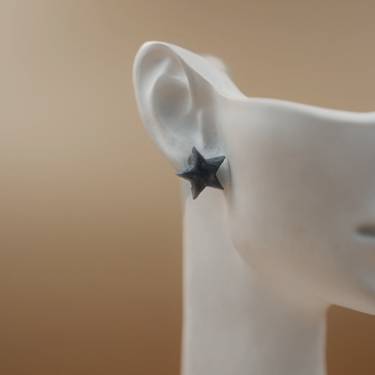 Aretes Estrellas Gris