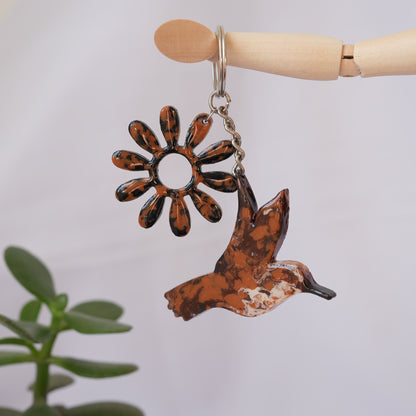 LLavero/Colgante Colibrí Inca bronceado + Asteráceas